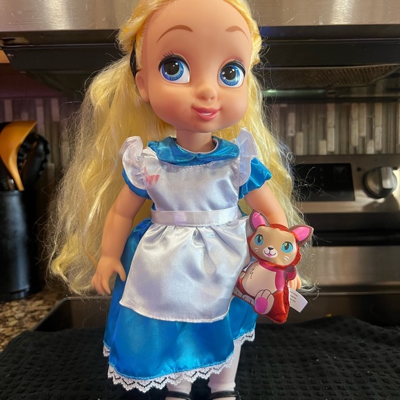 Disney Other - Baby Alice in Wonderland with Cat wristlet